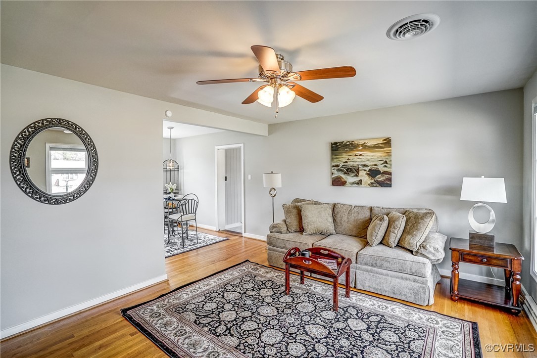 2703 Omega Road Henrico, VA 23228 - Photo 3 of 43 Living Room area featuring wood flooring, SUNNY ro