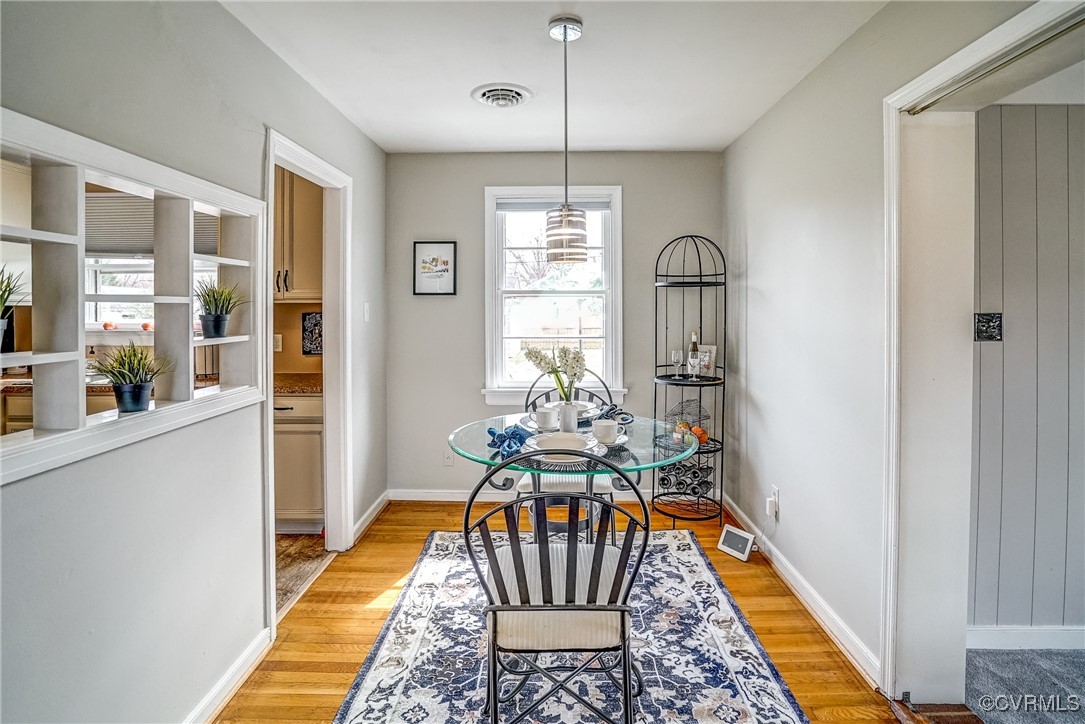 2703 Omega Road Henrico, VA 23228 - Photo 7 of 43 Dining area , wood floors, updated light fixture!