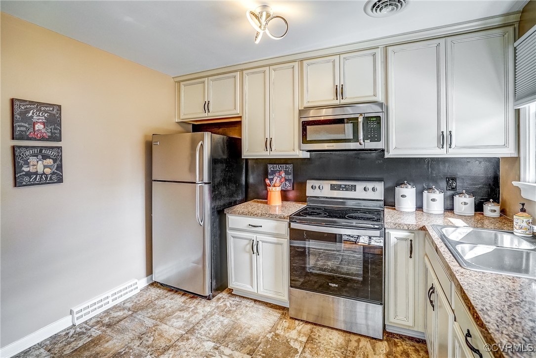 2703 Omega Road Henrico, VA 23228 - Photo 10 of 43 Kitchen featuring stainless steel appliances, upda