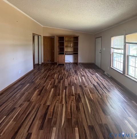11480 Blue Ridge Trail Windsor, VA 23487 - Photo 3 of 7 Unfurnished room with ornamental molding, dark woo