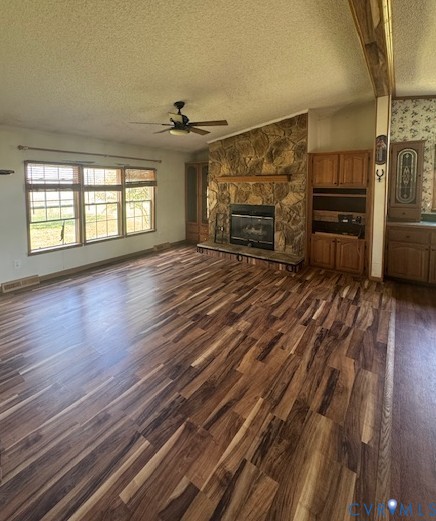 11480 Blue Ridge Trail Windsor, VA 23487 - Photo 5 of 7 Unfurnished living room with a textured ceiling, d