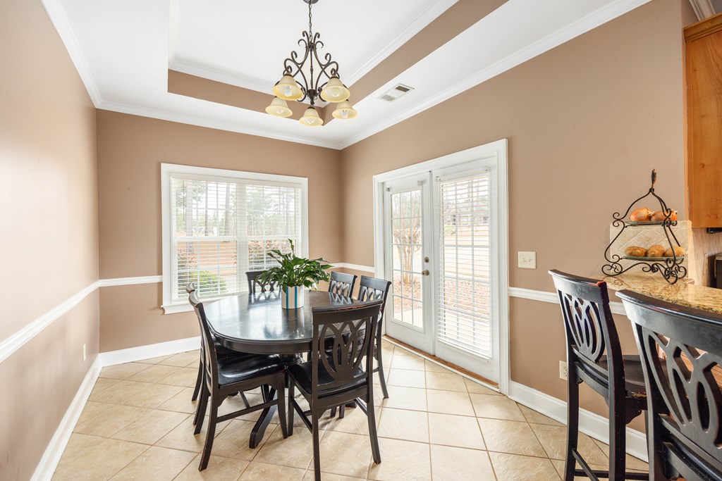 235 Voorhees Road Hamilton, GA 31811 - Photo 19 of 36 a view of a dining room with furniture window and outside view