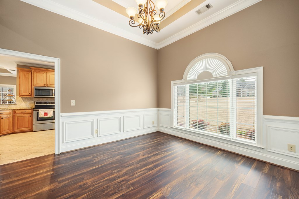 235 Voorhees Road Hamilton, GA 31811 - Photo 20 of 36 a view of a room with wooden floors and natural light