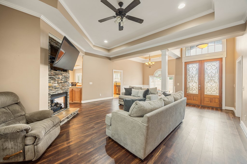 235 Voorhees Road Hamilton, GA 31811 - Photo 8 of 36 a living room with furniture and a fireplace