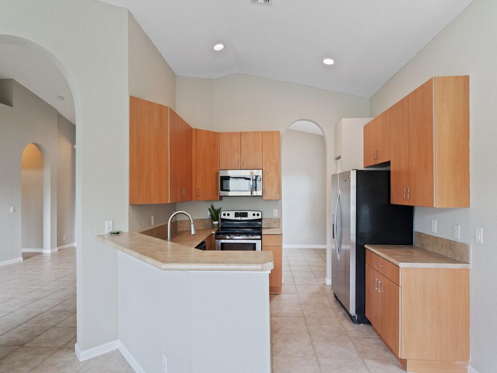 5937 Spanish River Road Fort Pierce, FL 34951 - Photo 14 of 46 5 Kitchen 1