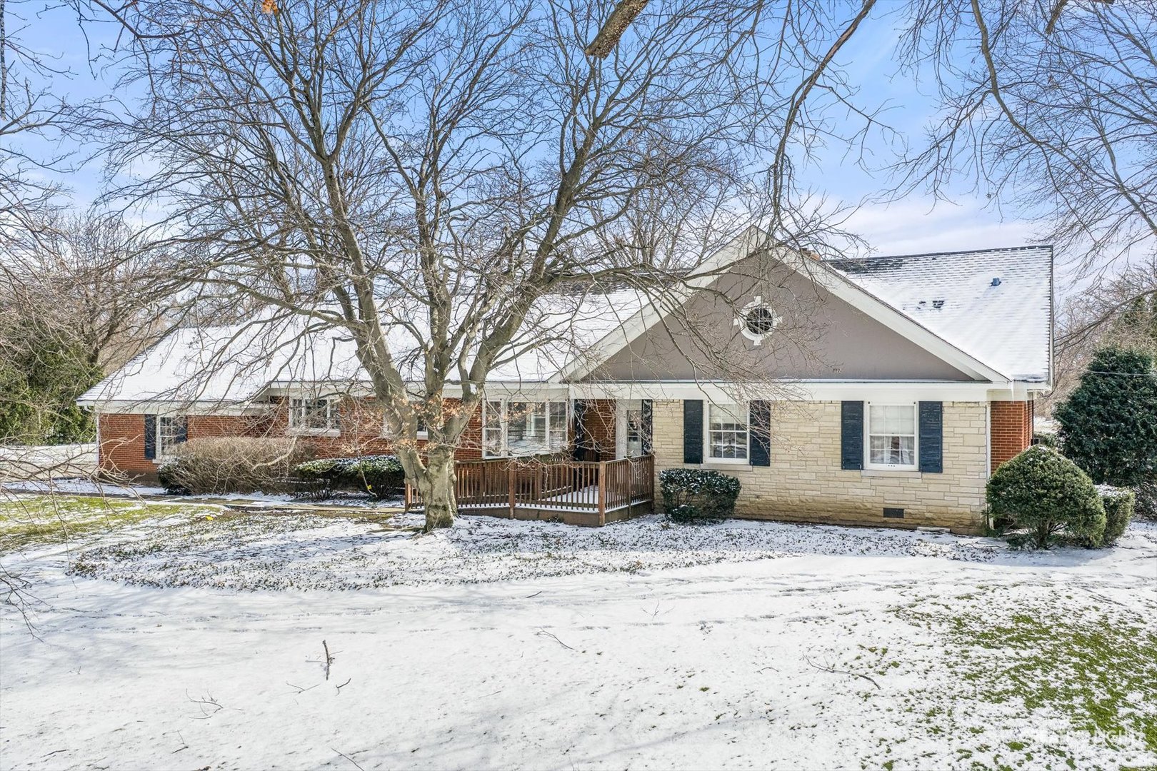 116 East Farnham Lane Wheaton, IL 60189 - Photo 1 of 12 a front view of house with yard and trees around