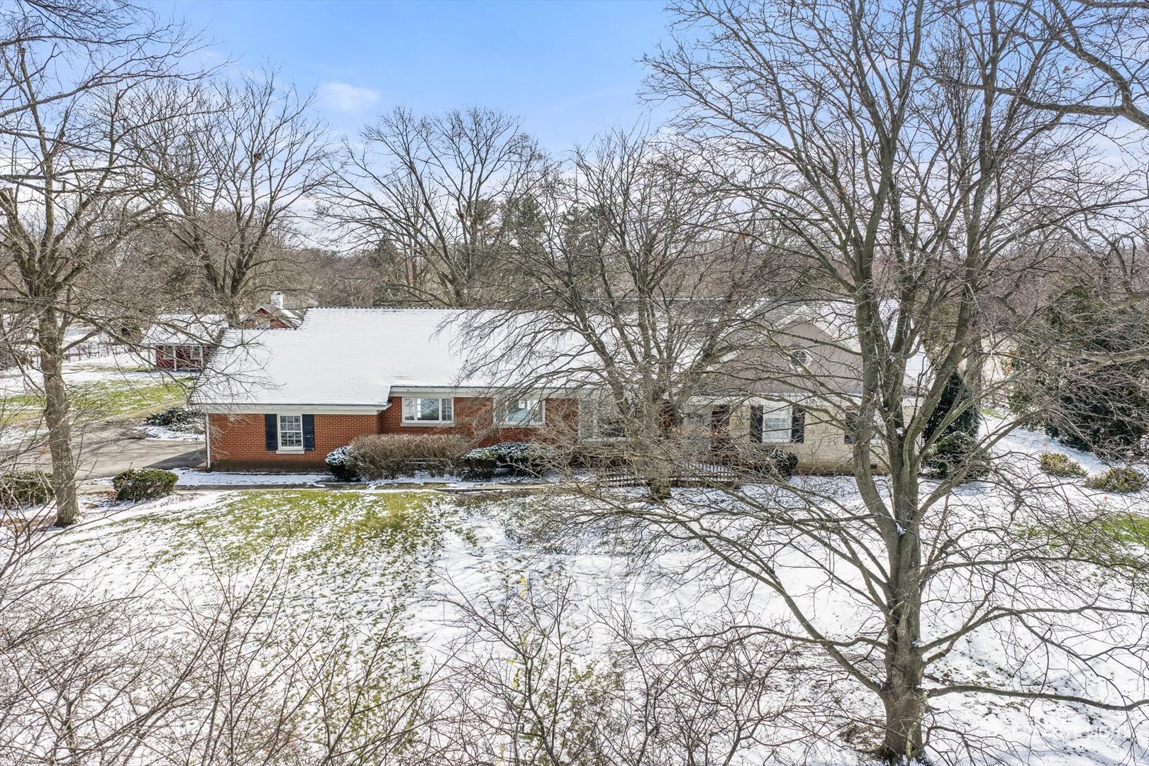 116 East Farnham Lane Wheaton, IL 60189 - Photo 2 of 12 a view of a house with a yard covered in snow
