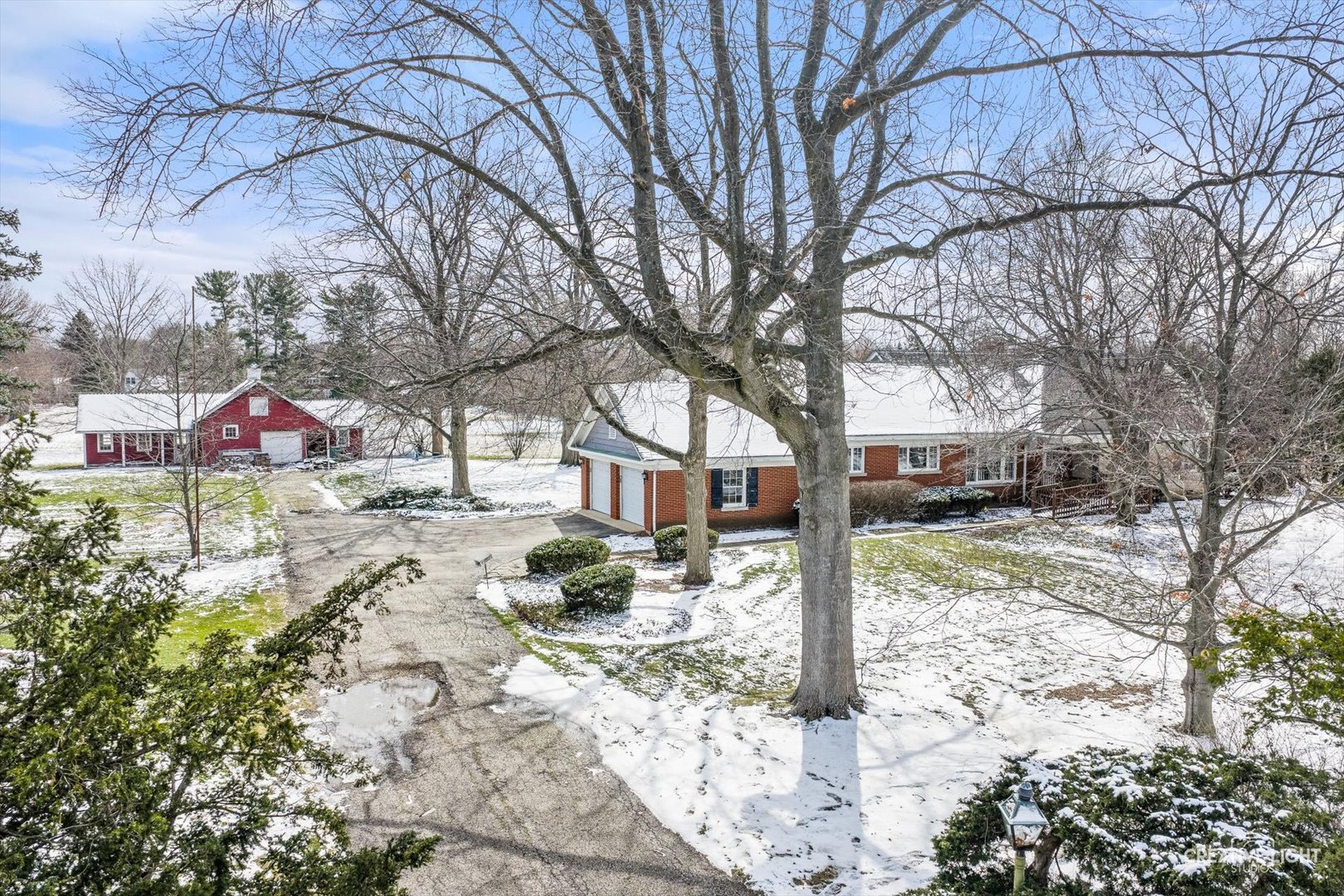 116 East Farnham Lane Wheaton, IL 60189 - Photo 6 of 12 a street view covered with snow