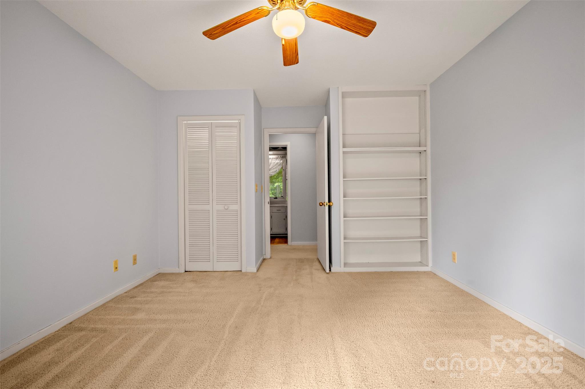 106 Bluebird Lane Tryon, NC 28782 - Photo 12 of 26 an empty room with closet and ceiling fan