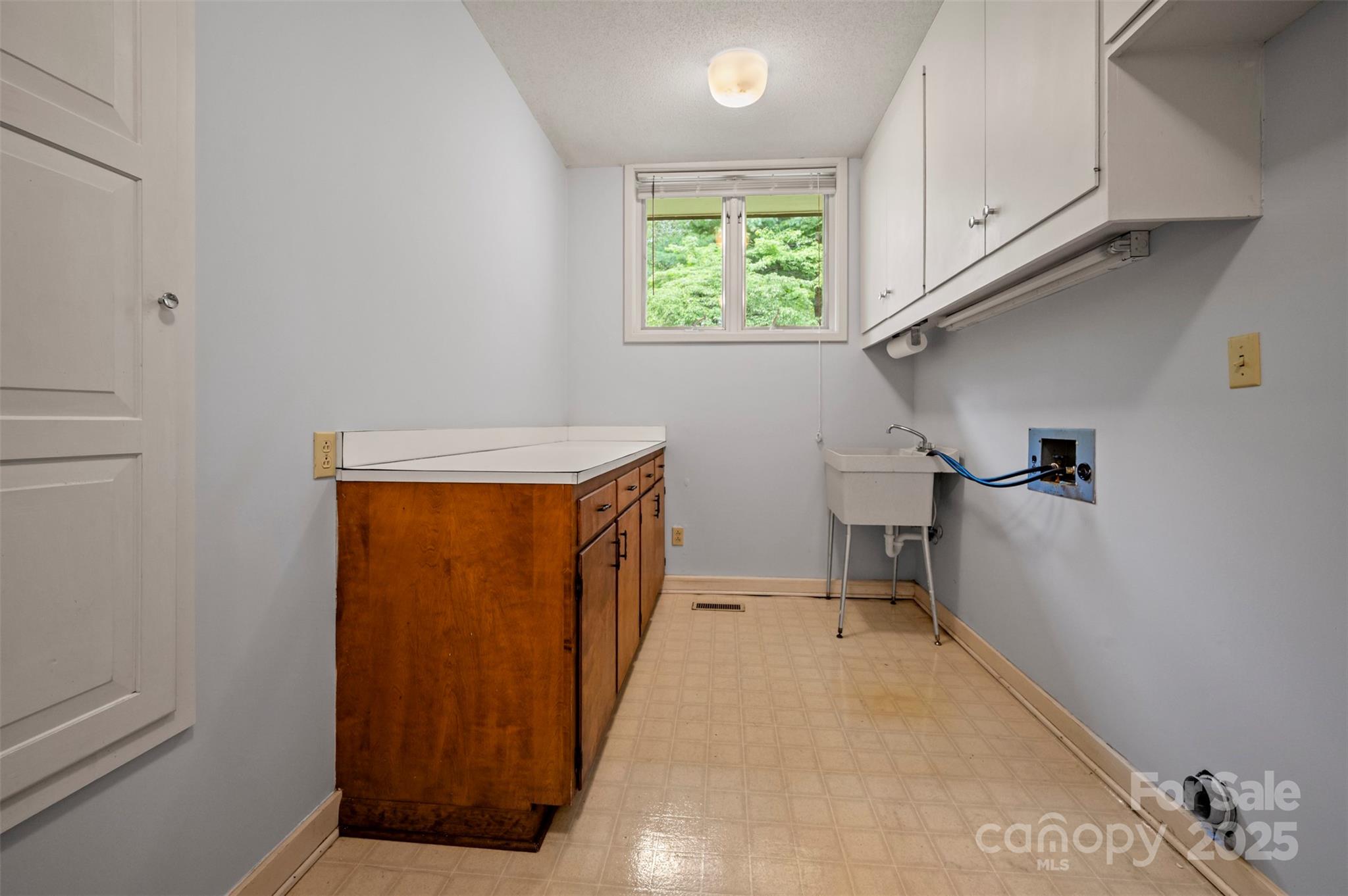 106 Bluebird Lane Tryon, NC 28782 - Photo 18 of 26 a view of a room with wooden floor and staircase