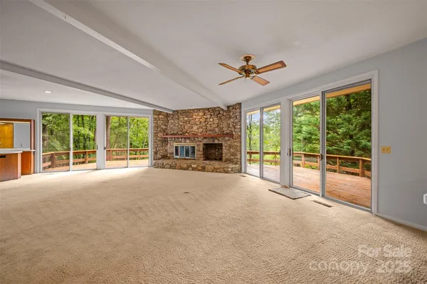 a big room with an ocean view and mountain view