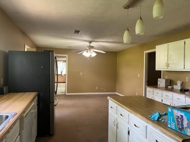 170 Ivy Lane Adamsville, TN 38310 - Photo 14 of 34 a kitchen with a sink and cabinets
