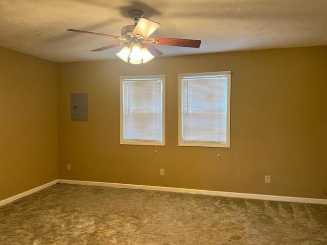 170 Ivy Lane Adamsville, TN 38310 - Photo 4 of 34 a view of an empty room with a window