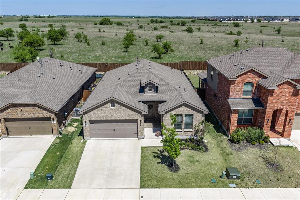 1864 Mensa Drive Haslet, TX 76052 - Photo 1 of 40 an aerial view of a house