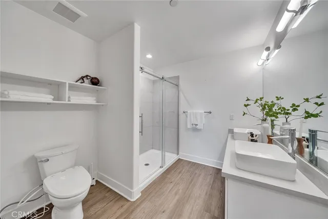 a view of city and mountain from a balcony