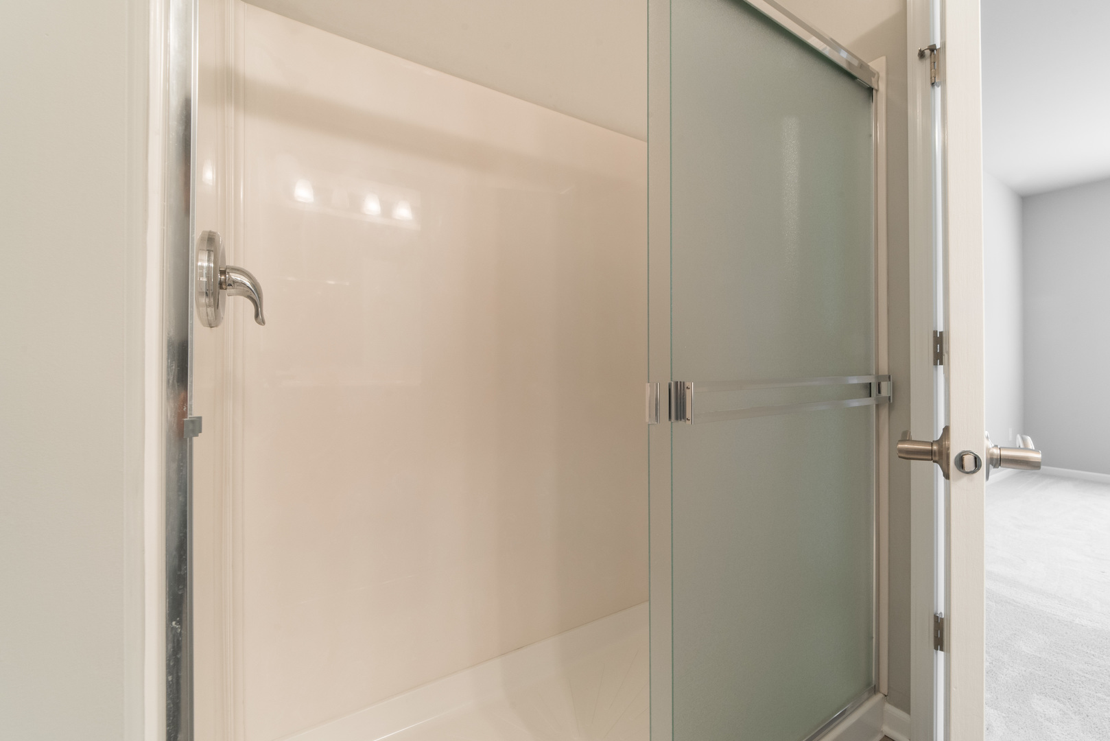 1111 Bailey Road Sycamore, IL 60178 - Photo 17 of 32 a bathroom with a glass shower door