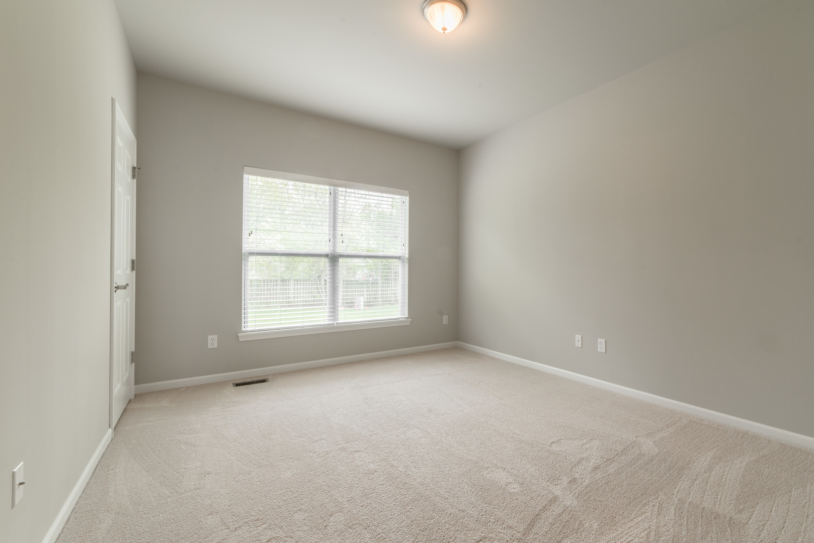 1111 Bailey Road Sycamore, IL 60178 - Photo 20 of 32 an empty room with a window