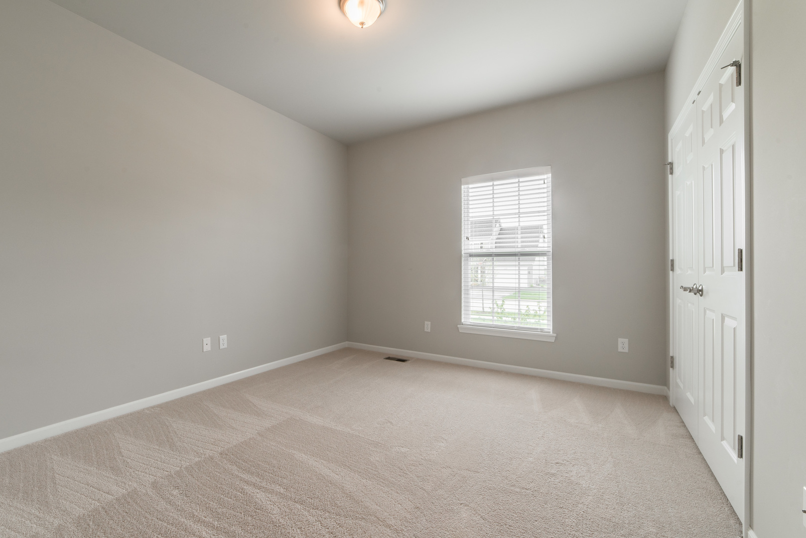 1111 Bailey Road Sycamore, IL 60178 - Photo 21 of 32 a view of an empty room with a window