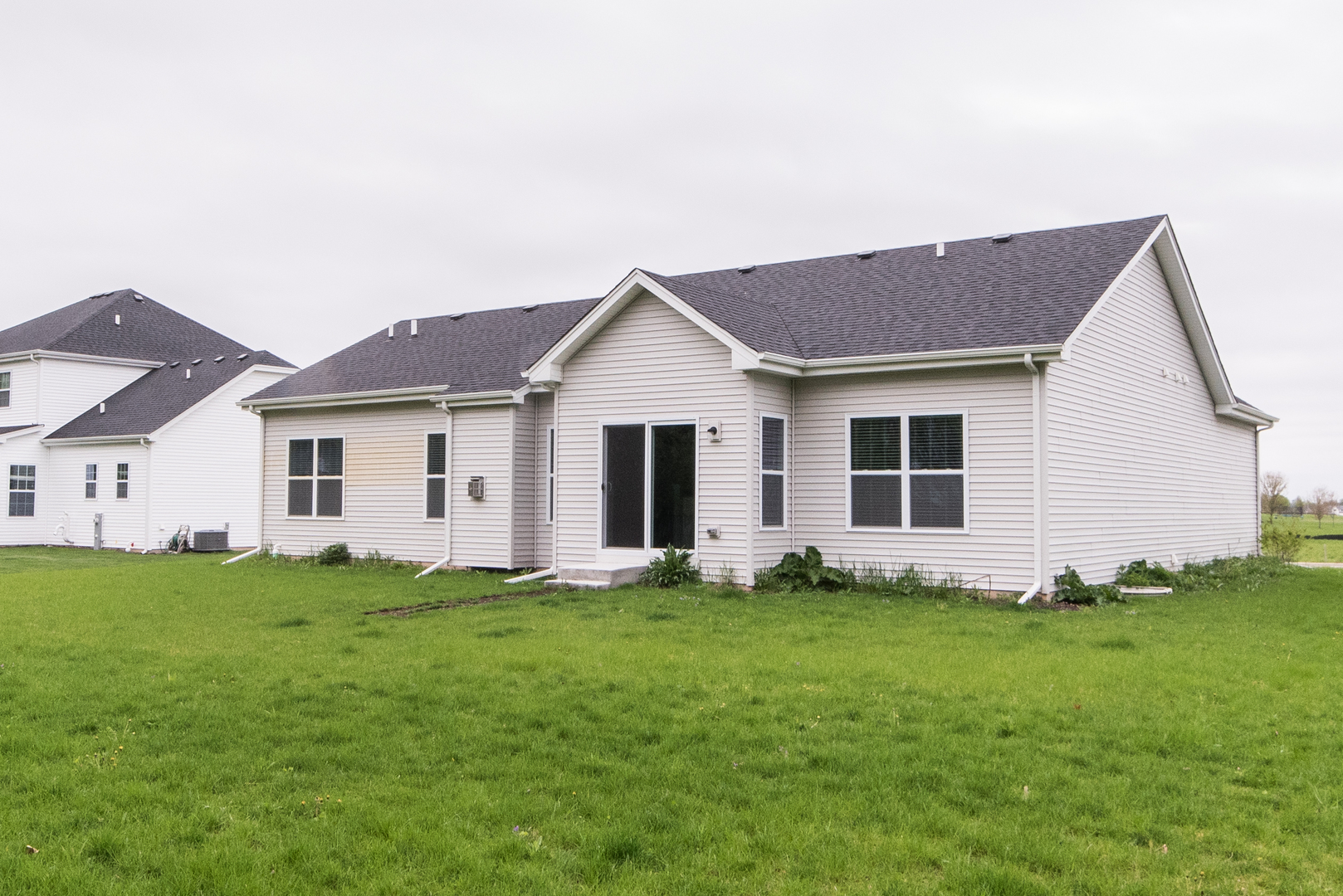 1111 Bailey Road Sycamore, IL 60178 - Photo 31 of 32 a big house with a big yard and more windows