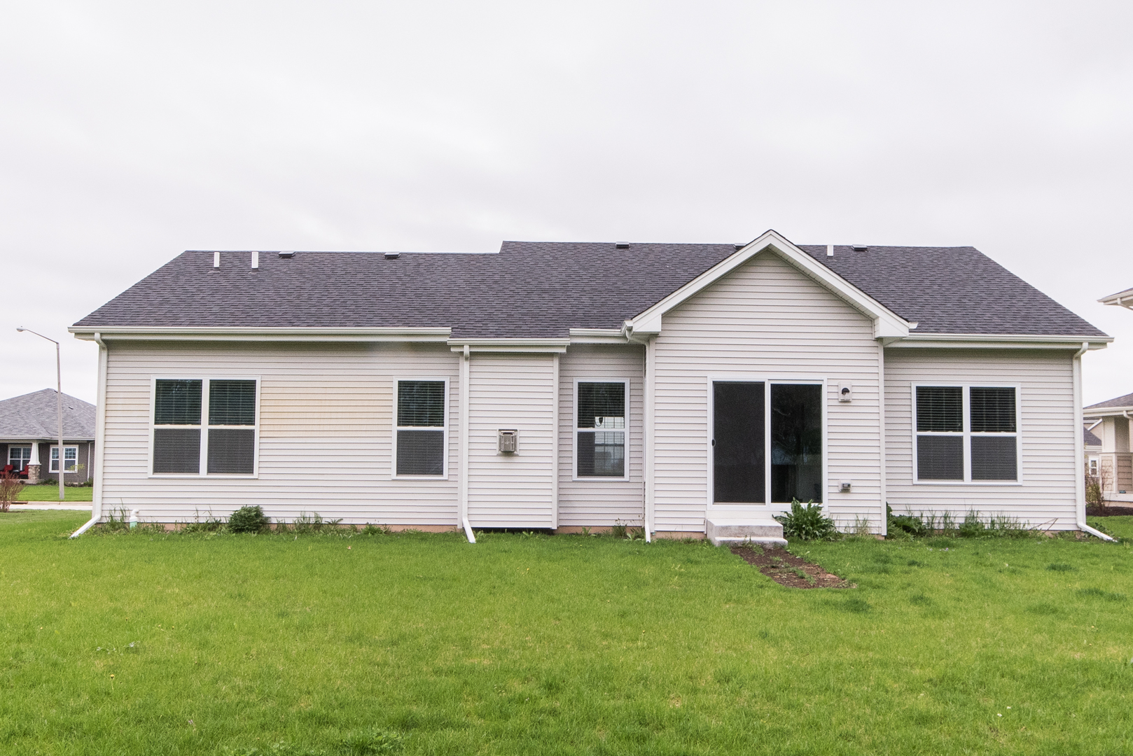 1111 Bailey Road Sycamore, IL 60178 - Photo 32 of 32 front view of a house with a yard