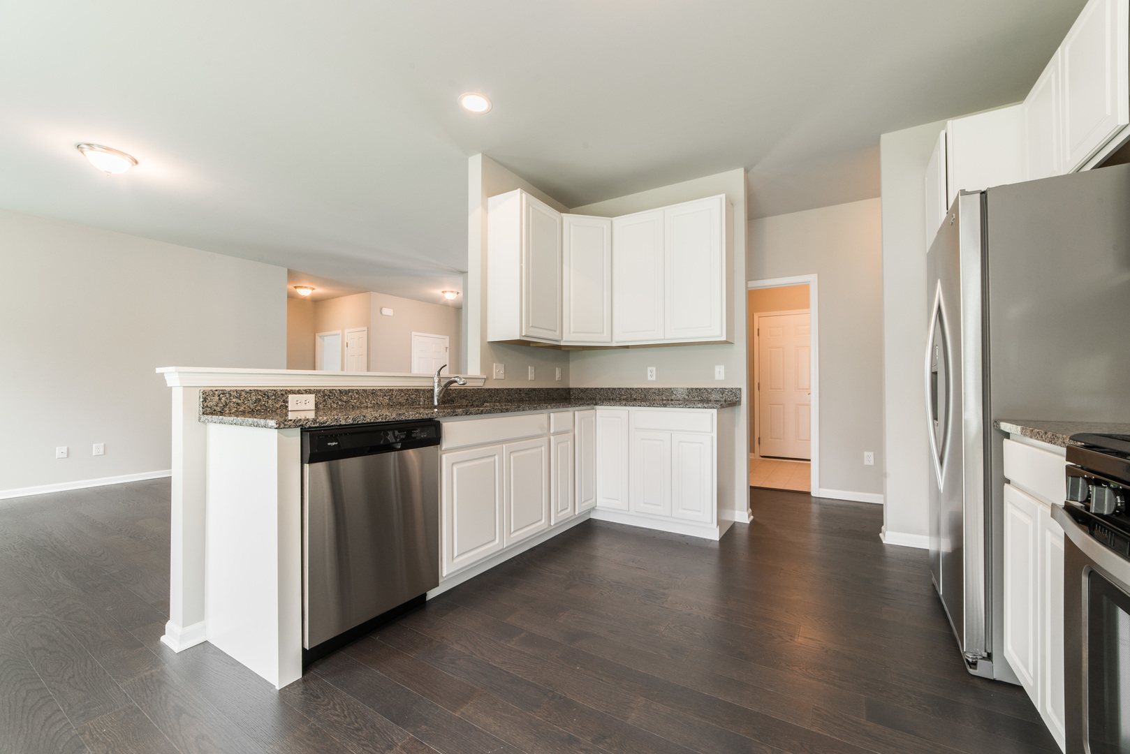 1111 Bailey Road Sycamore, IL 60178 - Photo 10 of 32 a kitchen with stainless steel appliances a refrigerator sink and microwave