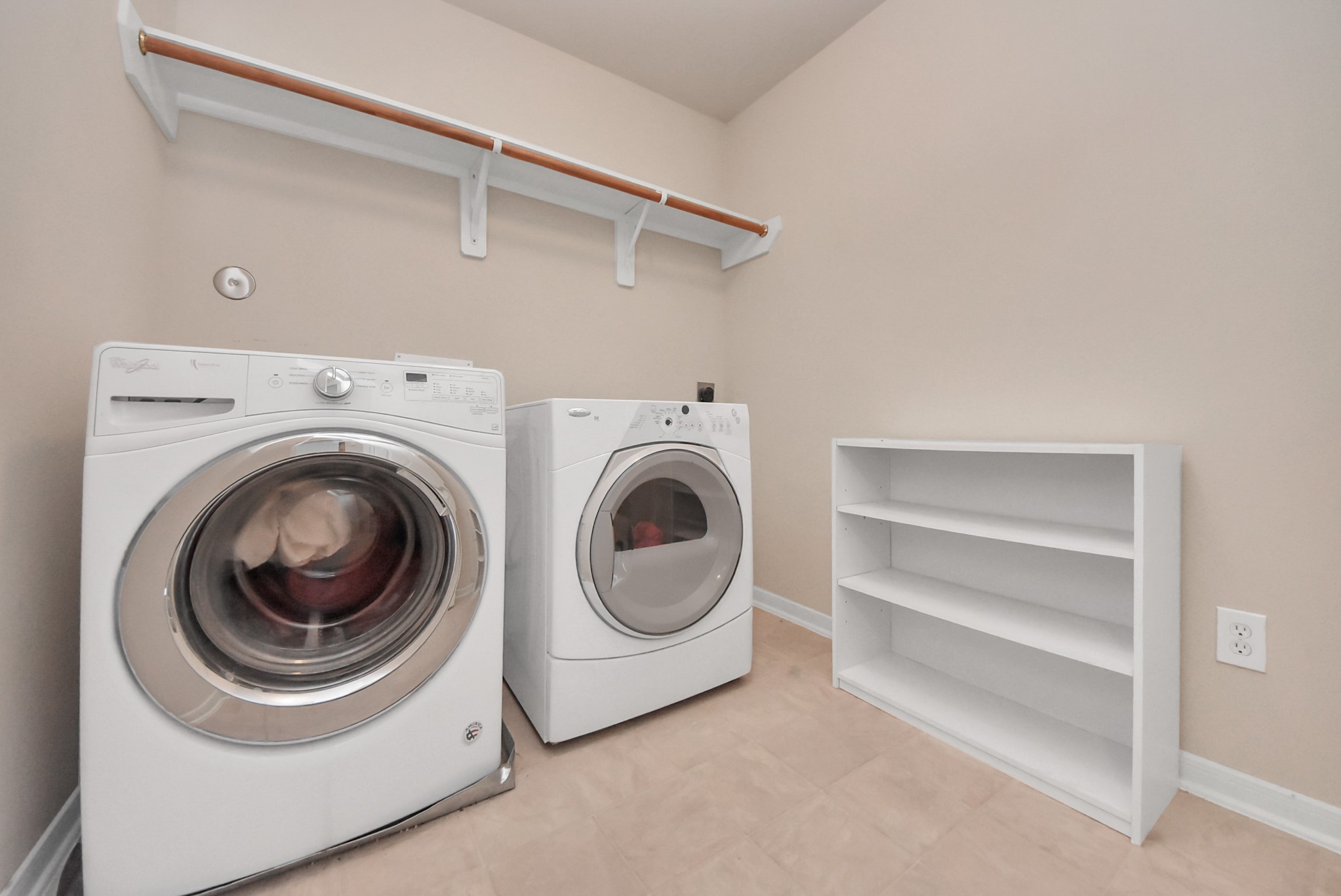 16820 Infield Court Conroe, TX 77385 - Photo 40 of 44 Generous 2nd floor laundry room.