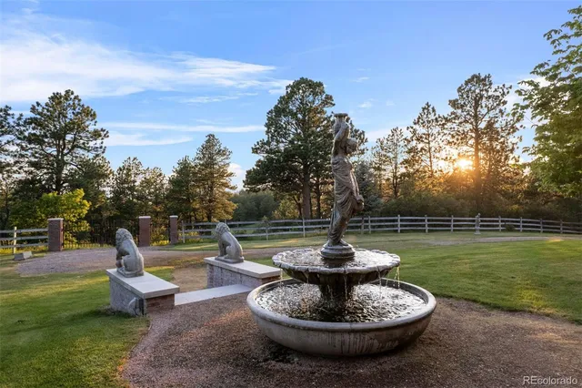 a view of a water with a fountain in the patio