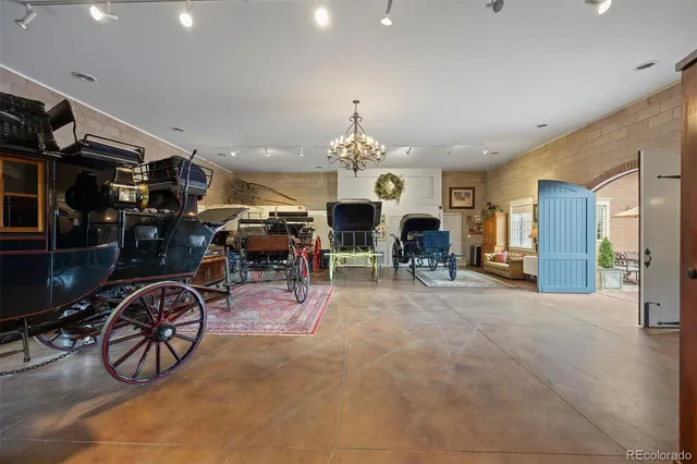 a view of a livingroom with furniture and a chandelier