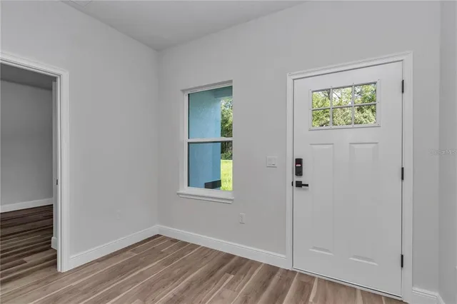 an empty room with windows