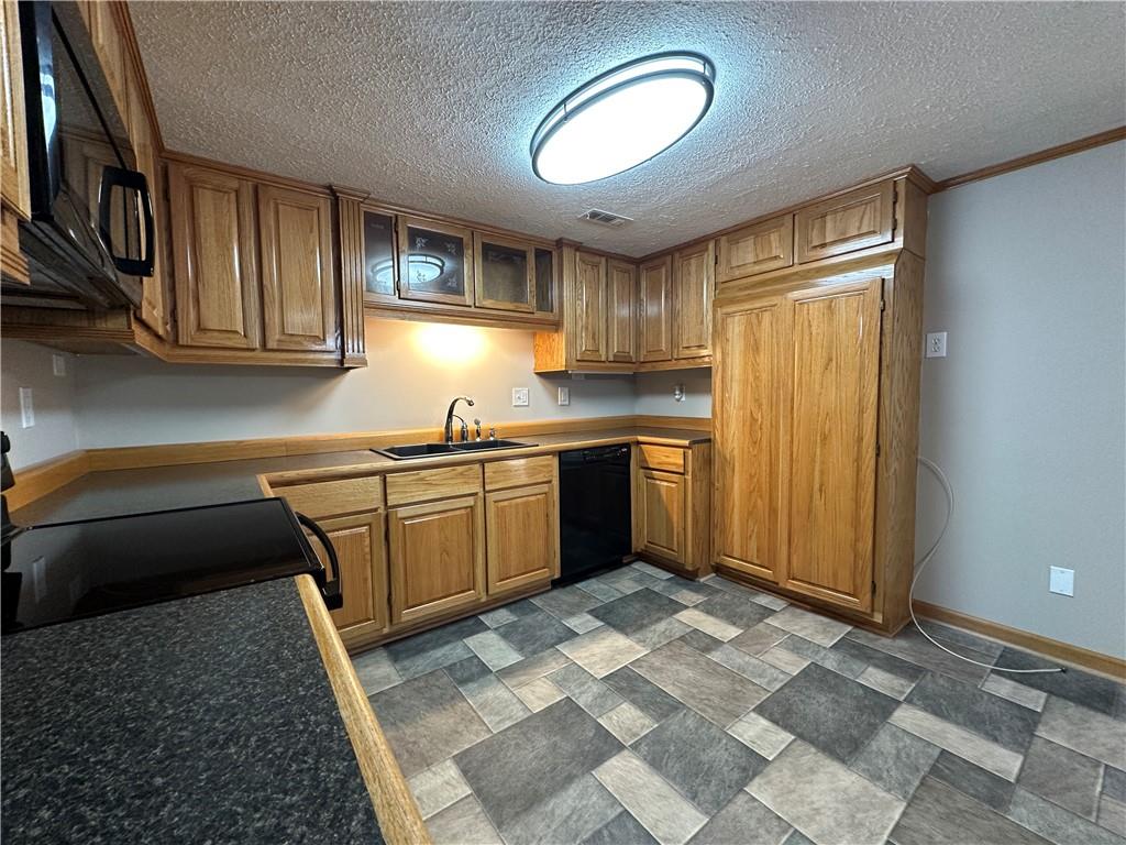 710 Spiva Road Temple, GA 30179 - Photo 15 of 31 a kitchen with a sink appliances and cabinets