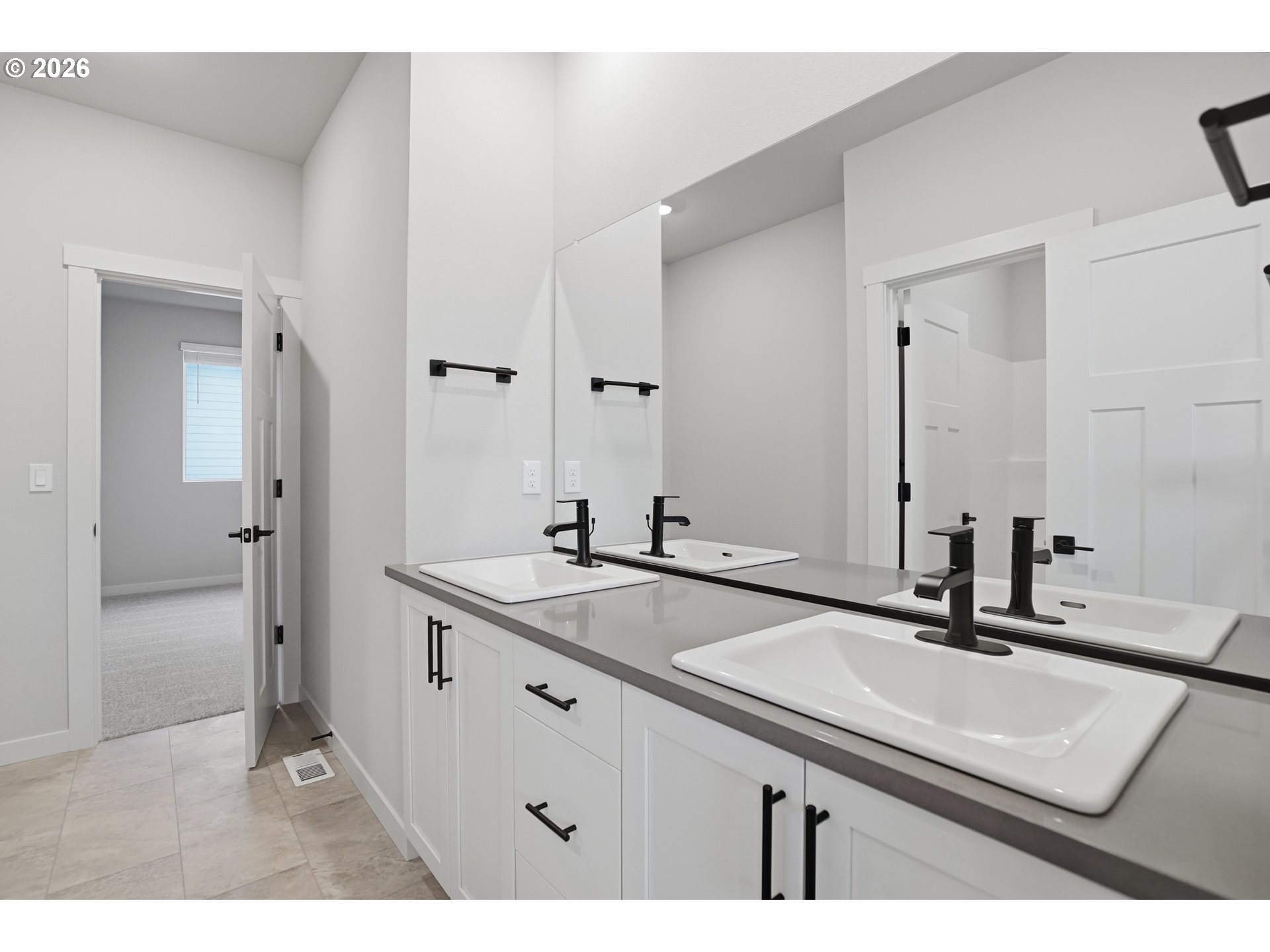5514 North 88th Avenue Camas, WA 98607 - Photo 11 of 17 a bathroom with a sink and a mirror