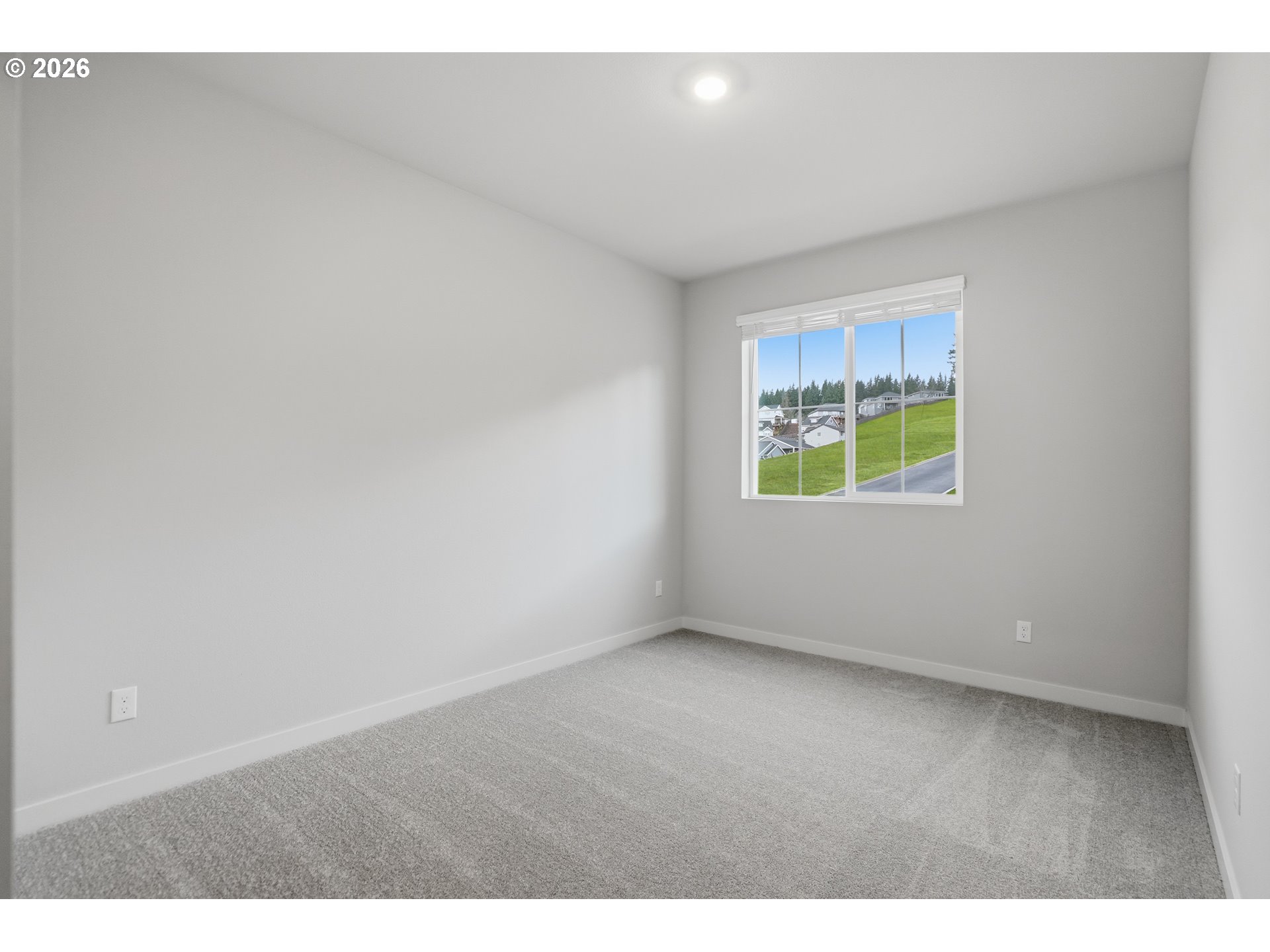 5514 North 88th Avenue Camas, WA 98607 - Photo 16 of 17 a view of an empty room with a window