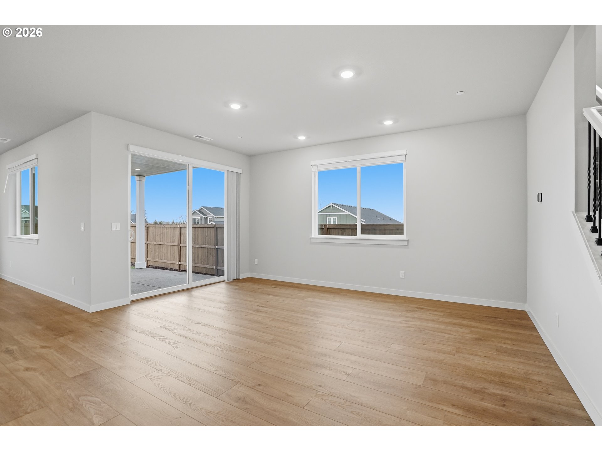 5514 North 88th Avenue Camas, WA 98607 - Photo 4 of 17 a view of an empty room with wooden floor and a window