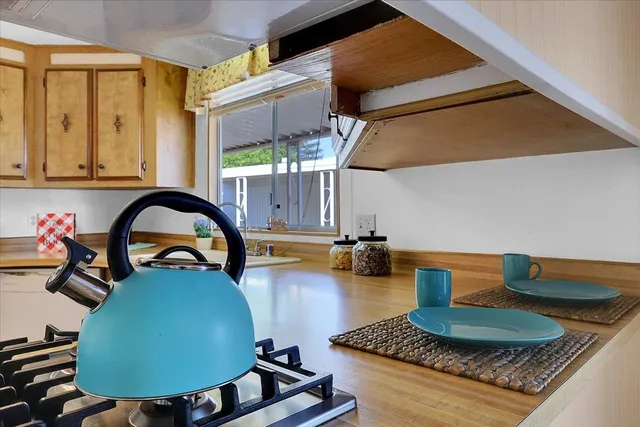 a room with furniture and a wooden floor