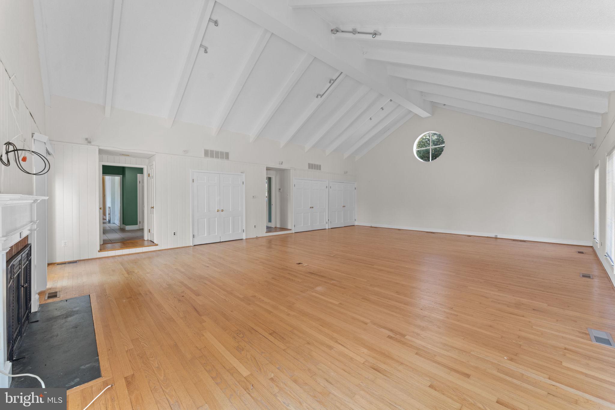 901 Walker Road Great Falls, VA 22066 - Photo 21 of 76 a view of empty room with wooden floor