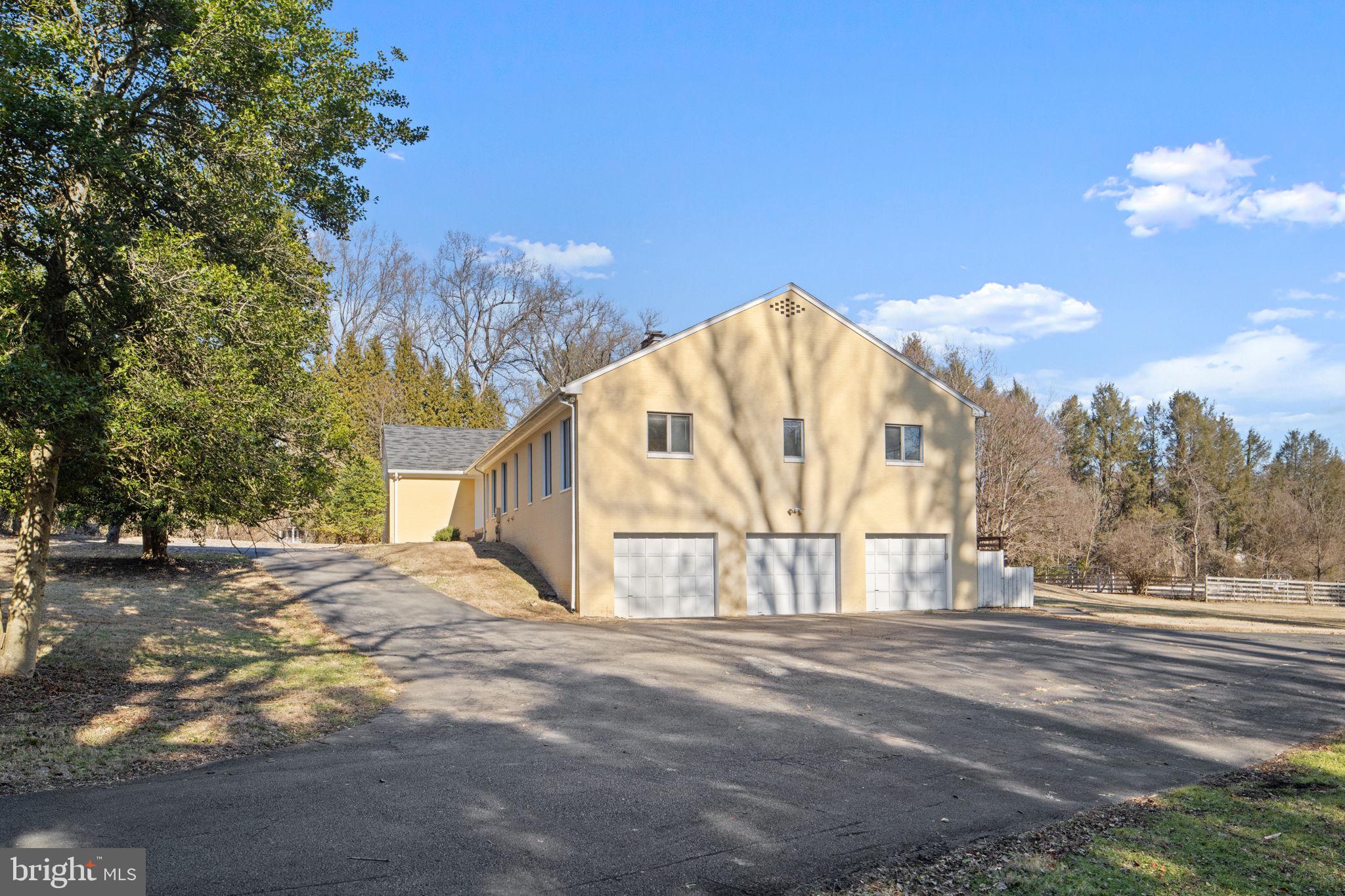901 Walker Road Great Falls, VA 22066 - Photo 65 of 76 a view of a house with a snow