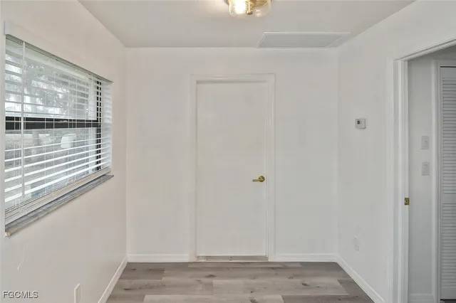 a view of small space with wooden floor