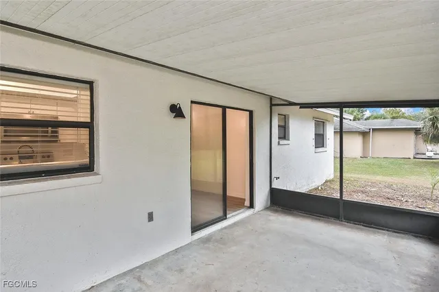 a view of an empty room with window