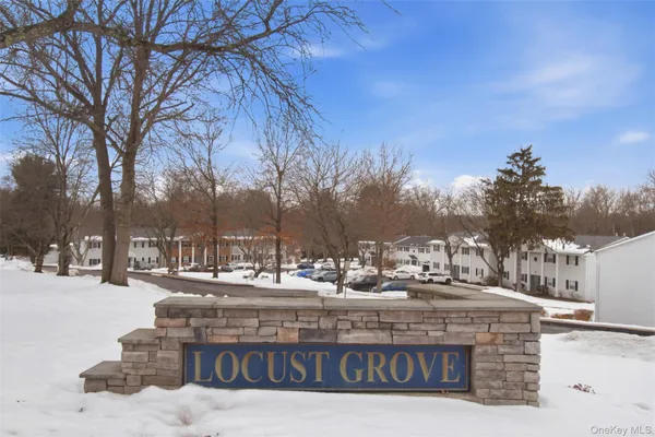 a view of street with snow on both side