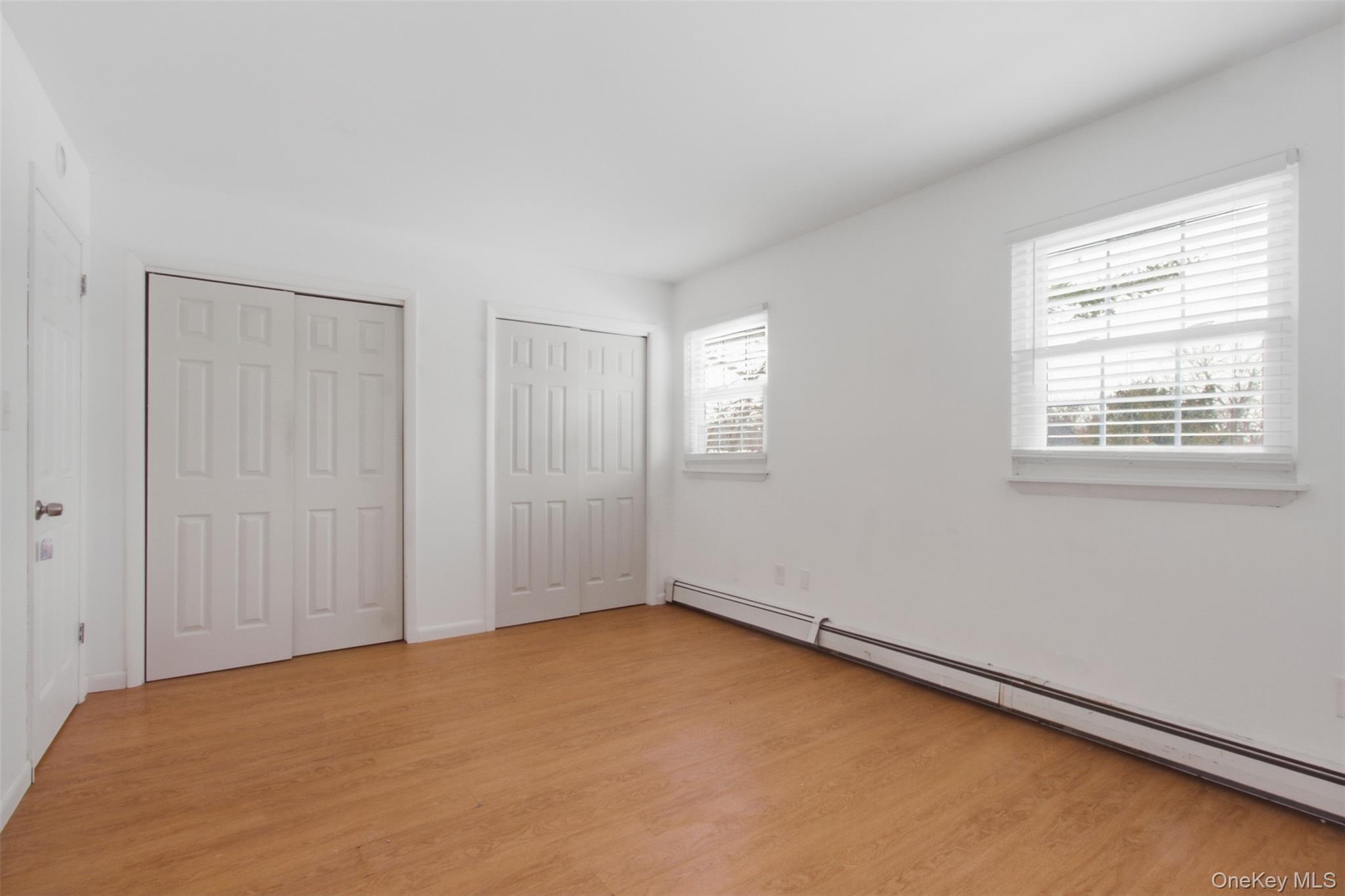 8 Ivy Court, Unit B Fishkill, NY 12524 - Photo 19 of 21 an empty room with windows
