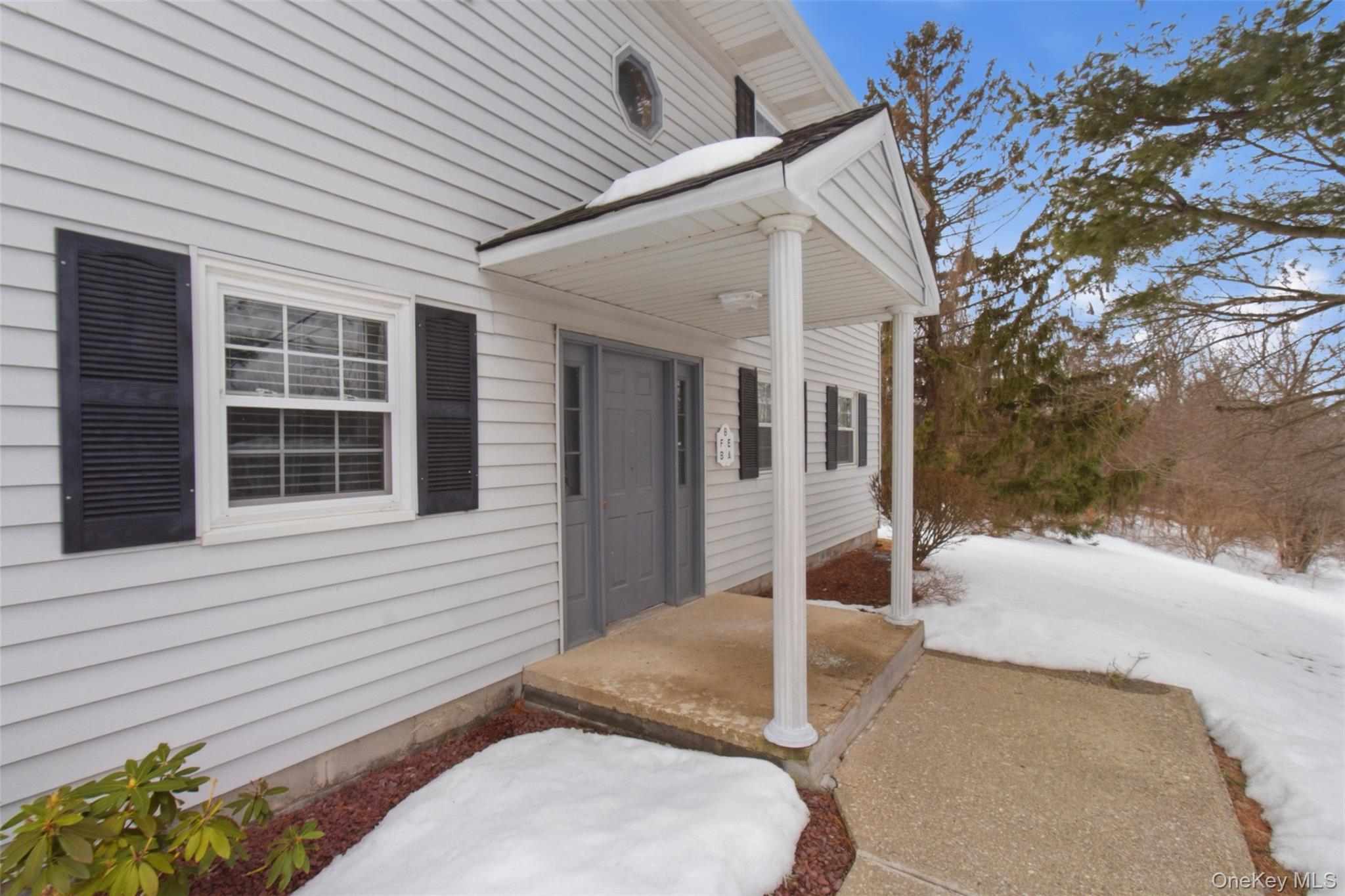 8 Ivy Court, Unit B Fishkill, NY 12524 - Photo 3 of 21 a porch with seating space