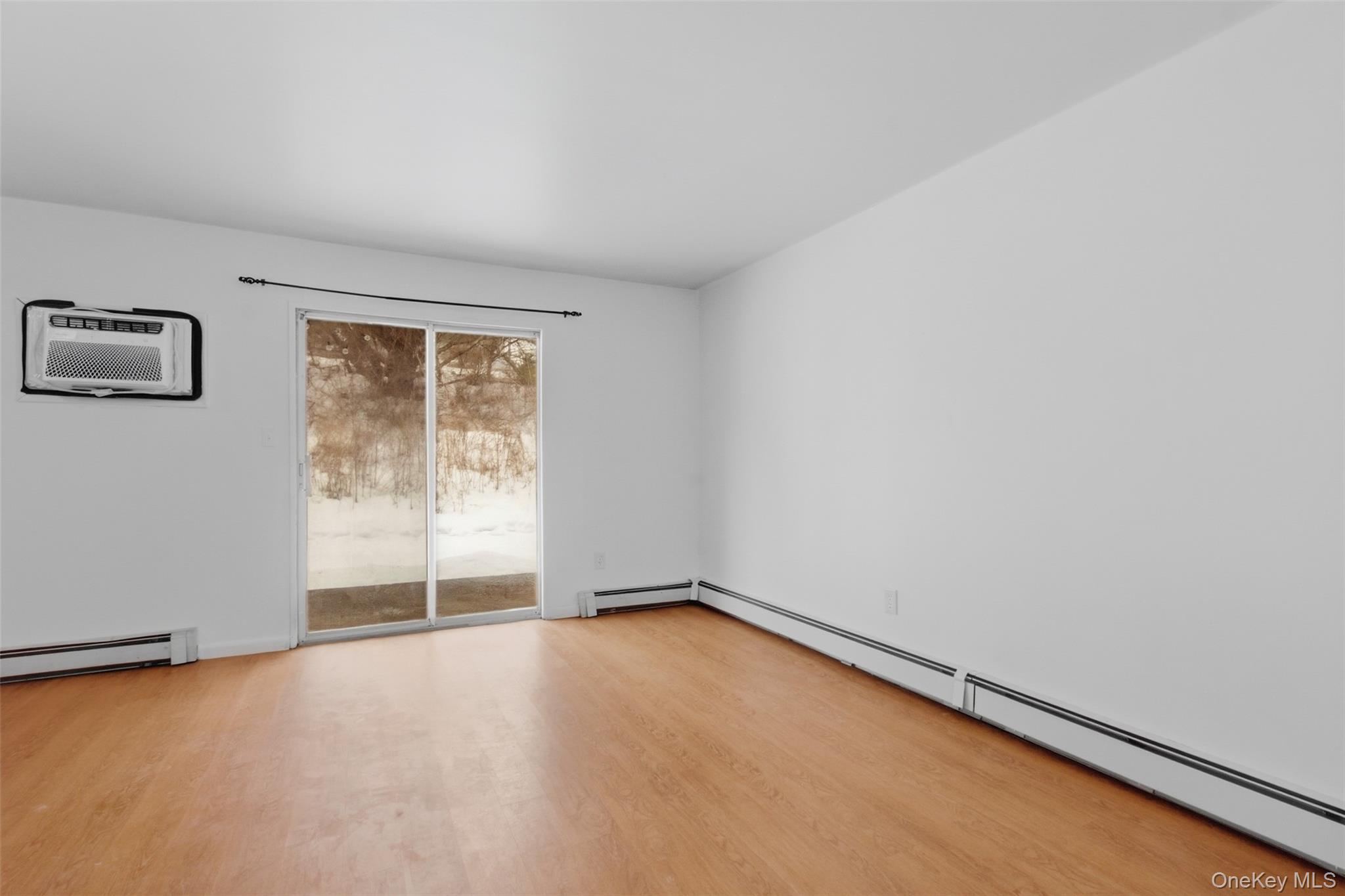 8 Ivy Court, Unit B Fishkill, NY 12524 - Photo 6 of 21 an empty room with a empty space and window
