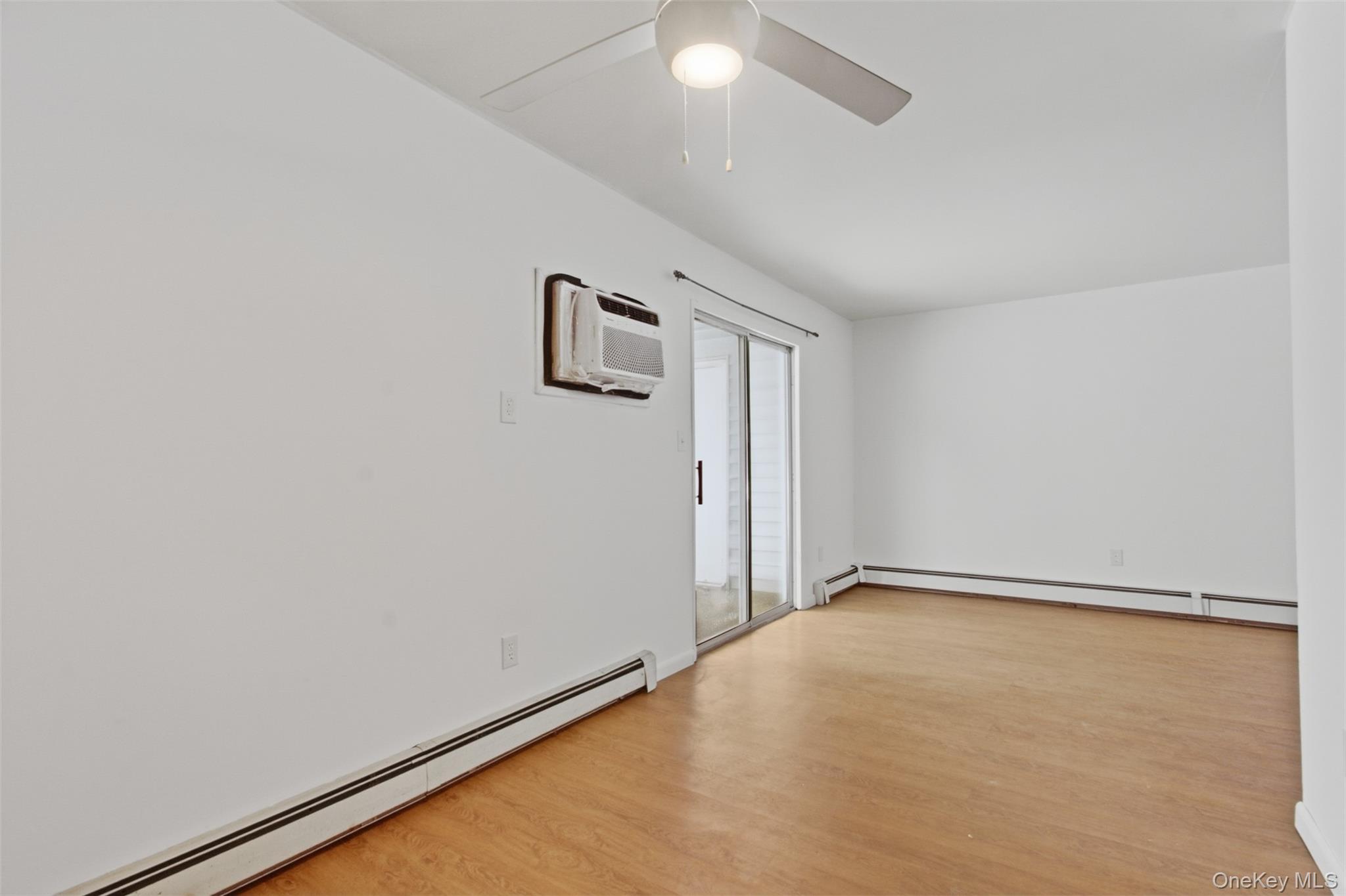 8 Ivy Court, Unit B Fishkill, NY 12524 - Photo 10 of 21 an empty room with a empty space and a window