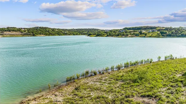 a view of a lake from a mountain
