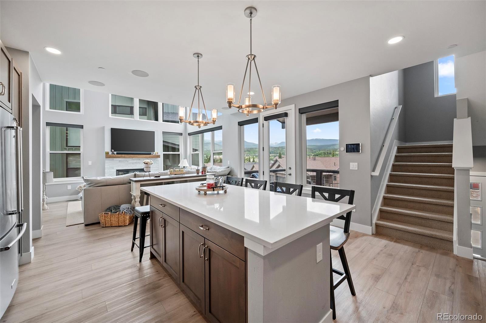 116 River Run Circle Fraser, CO 80442 - Photo 2 of 29 a large kitchen with a table and chairs