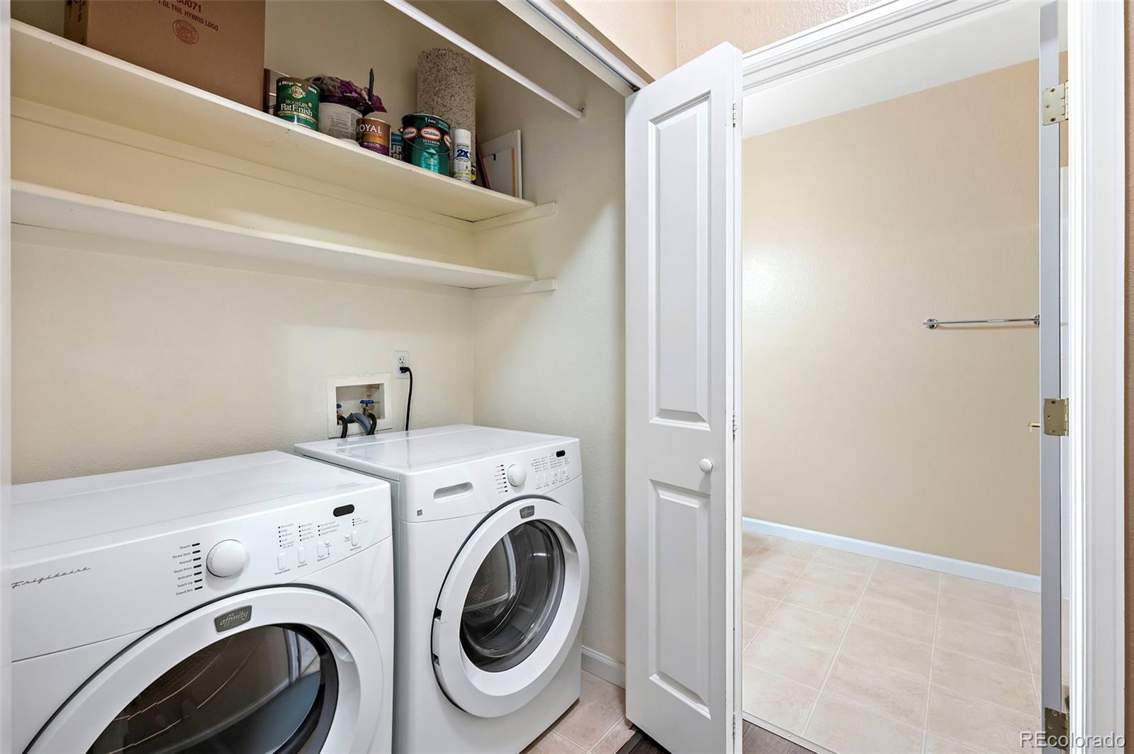 4064 South Carson Street, Unit 101 Aurora, CO 80014 - Photo 16 of 19 a utility room with dryer and washer