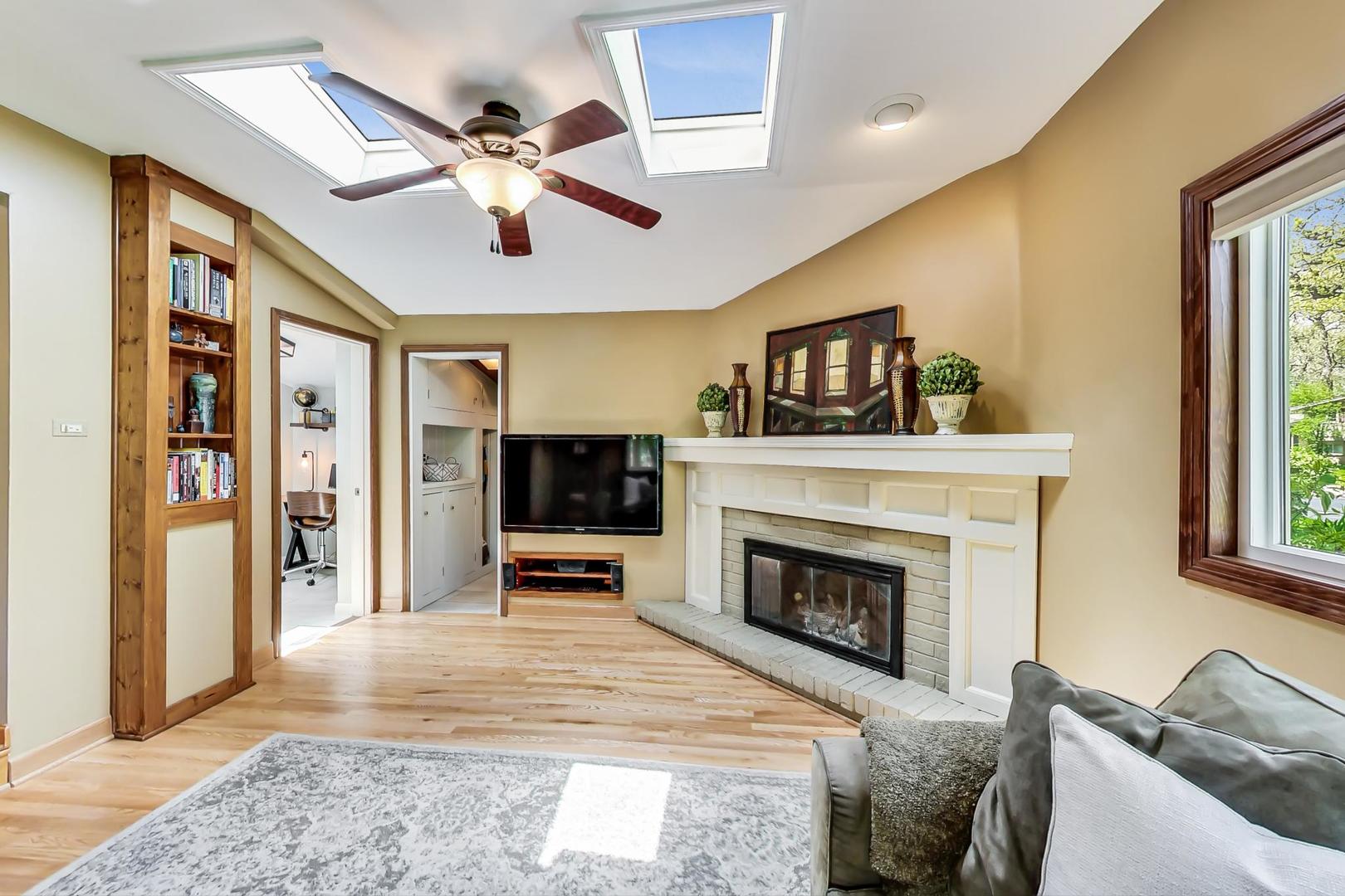 305 Dunbar Road Mundelein, IL 60060 - Photo 13 of 44 a living room with furniture and a fireplace