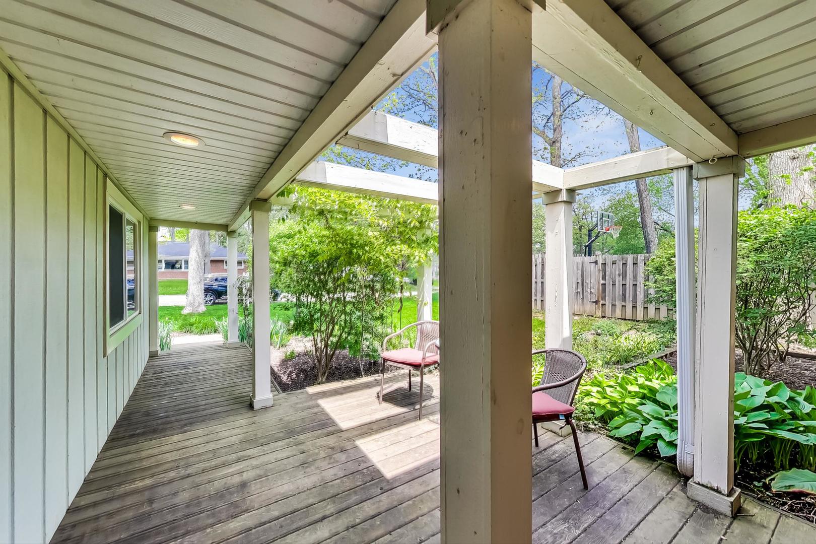 305 Dunbar Road Mundelein, IL 60060 - Photo 3 of 44 a view of a porch with wooden floor