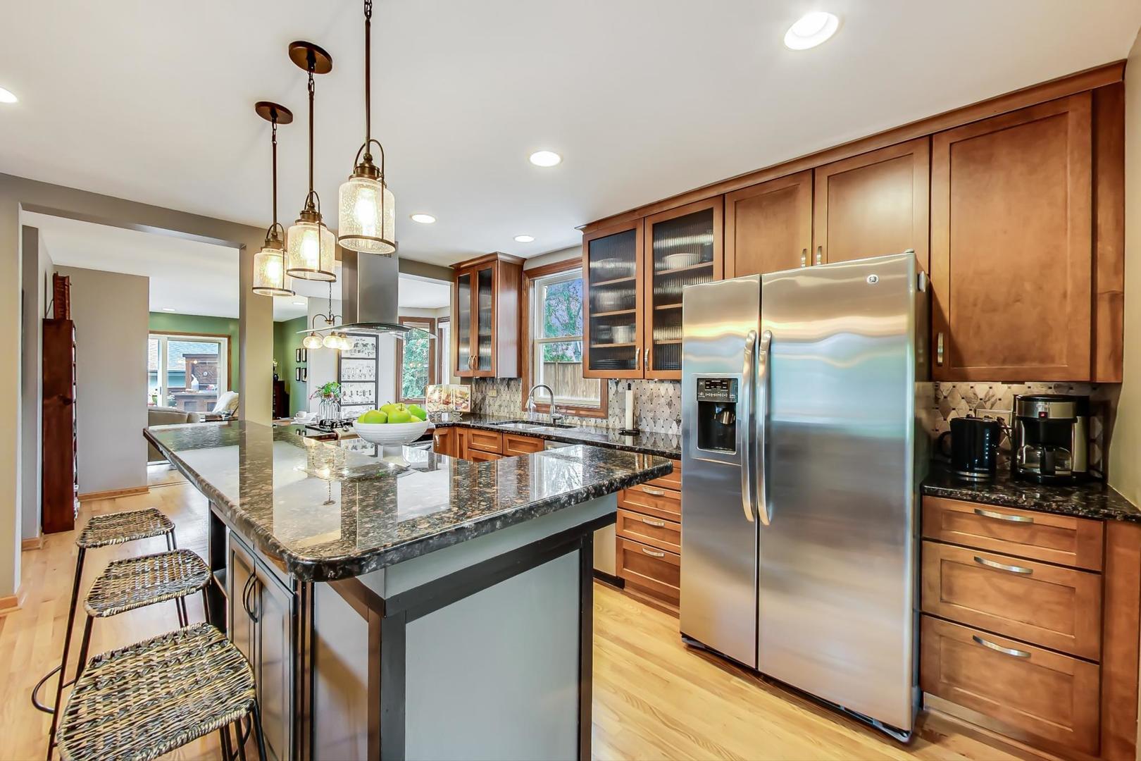 305 Dunbar Road Mundelein, IL 60060 - Photo 8 of 44 a kitchen with stainless steel appliances granite countertop a refrigerator a oven and a sink