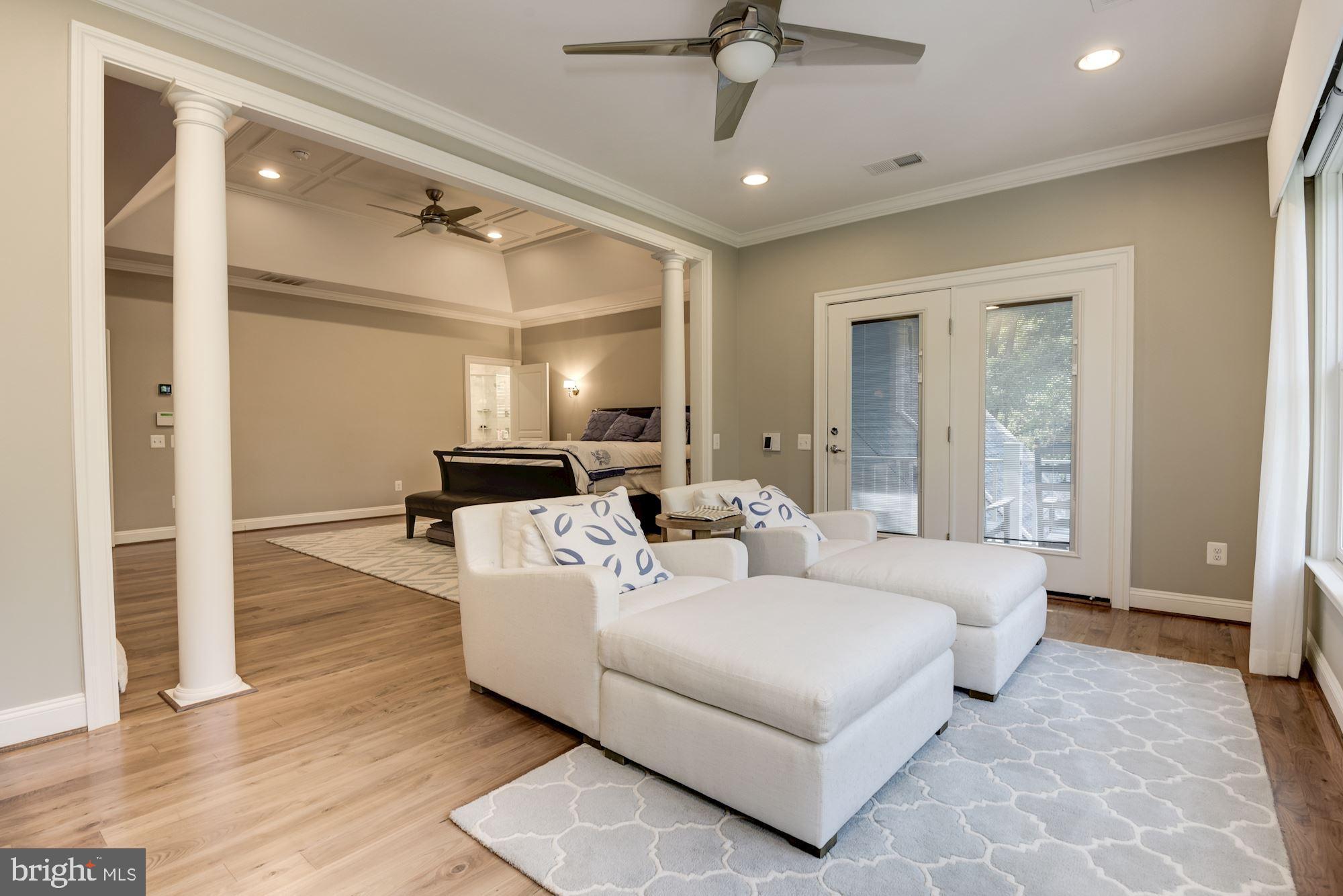 11645 Pine Tree Drive Fairfax, VA 22033 - Photo 18 of 48 a bed room with a bed and a chandelier